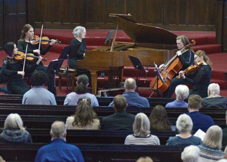 The Manderley Strings perform Feb. 7 at the Great Hall in Ottawa. The event was sponsored by Ottawa Center for the Arts.
