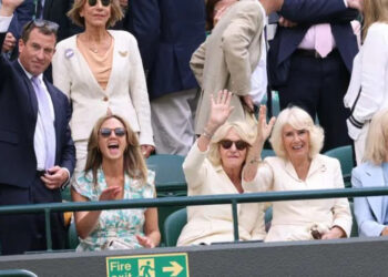 Peter Phillips with Harriet Sperling, Annabel Elliot and Queen Camilla in the royal box during day ten of The Championships Wimbledon in 2024. By: MEGA