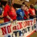 Members of Stand Up KC attend a City Council meeting ahead of a vote on the potential relocation of the Kansas City Royals baseball stadium to the downtown area, on Thursday, April 16, 2026.