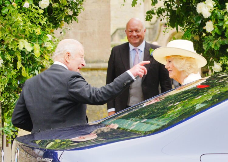 The King and Queen arriving at the church in Kemble (Ben Birchall/PA)