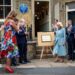 Queen Camilla leaves the Brontë house to a round of applause.