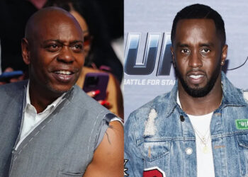 Dave Chappelle in a sleeveless jacket, smiling, and Sean "Diddy" Combs in a denim jacket, posing at an event.