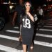 Rihanna styled the sports jersey trend with Nike sneakers and a Louis Vuitton Speedy Bag in NYC