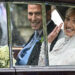 Harriet Sperling waves from a vehicle as she sits with Peter Phillips (Reuters)