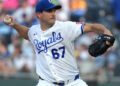 Royals' Lugo leaves after getting hit in forehead by line d…