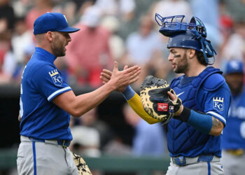 Kansas City Royals closer Alex Lange and Carter Jensen celebrate after the game against the Chicago White Sox at Rate Field on June 28, 2026 in Chicago, Illinois.