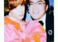 Two people posing together, one in a bright pink outfit, with handwritten text "Cole & Bowen" at the bottom.