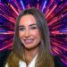 Dani Dyer in front of a firework-like background