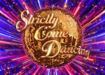 colourful explosion behind the Strictly Come Dancing golden glitter ball