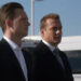 Mike Ross and Harvey Specter standing next to one another with Ross in the foreground