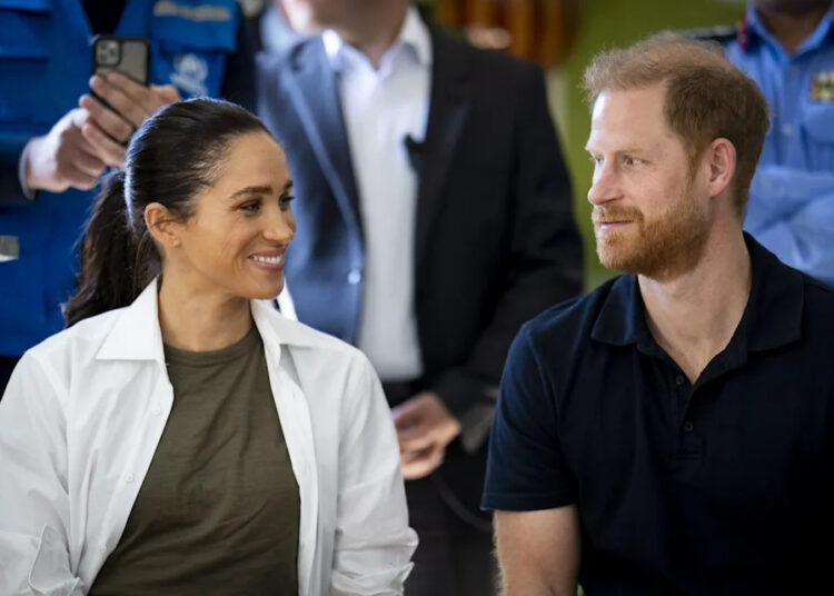 Harry and Meghan earlier this year during their visit to Jordan