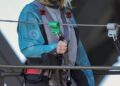 Sydney Sweeney climbing the Sydney Harbour Bridge.