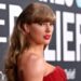 Taylor Swift posing on a red carpet.