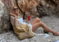 A photo of Tess Daly wearing white shorts