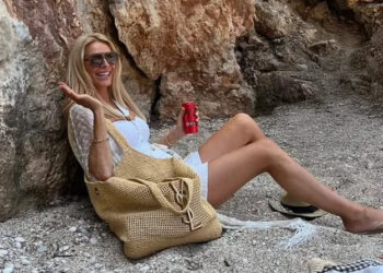 A photo of Tess Daly wearing white shorts