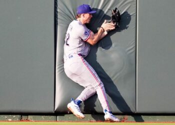 Texas Rangers survive bruising battle against Kansas City Royals in 10
