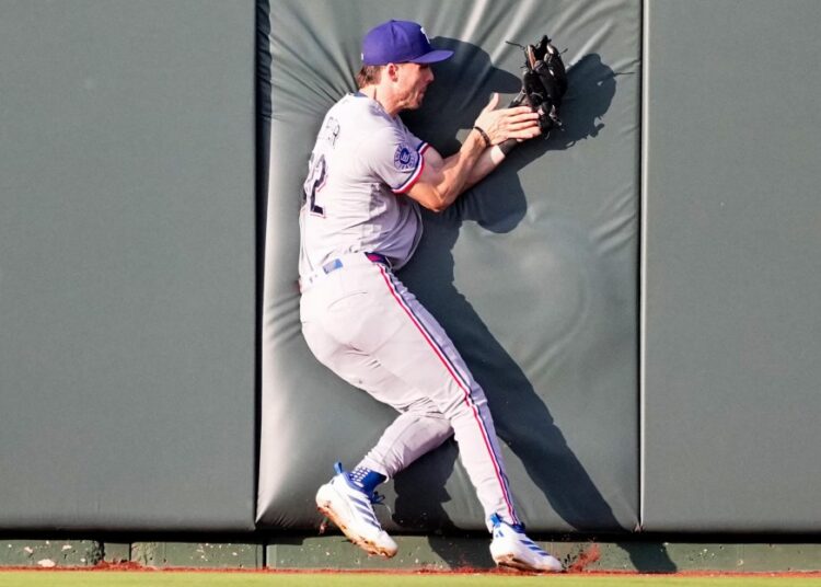 Texas Rangers survive bruising battle against Kansas City Royals in 10