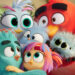 Silver and Red embrace their children Glider, June, and Olly with their pet Fuzzy in 'The Angry Birds Movie 3'Credit: Paramount Pictures