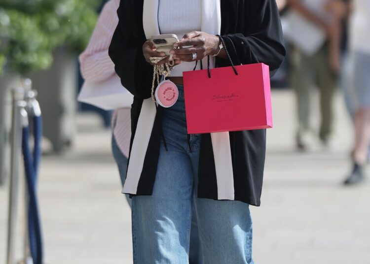 Venus Williams showcased her chunky leather loafers beneath the split-hem jeans trend