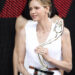 Princess Charlene holding a trophy