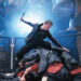 Xie Miao's Wang Wei stands atop a pile of thugs wielding a hammer in The Furious