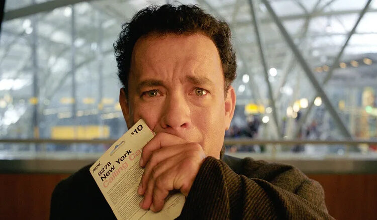 Tom Hanks covering mouth