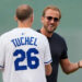 Harry Kane, right, congratulates Tuchel after the pitch