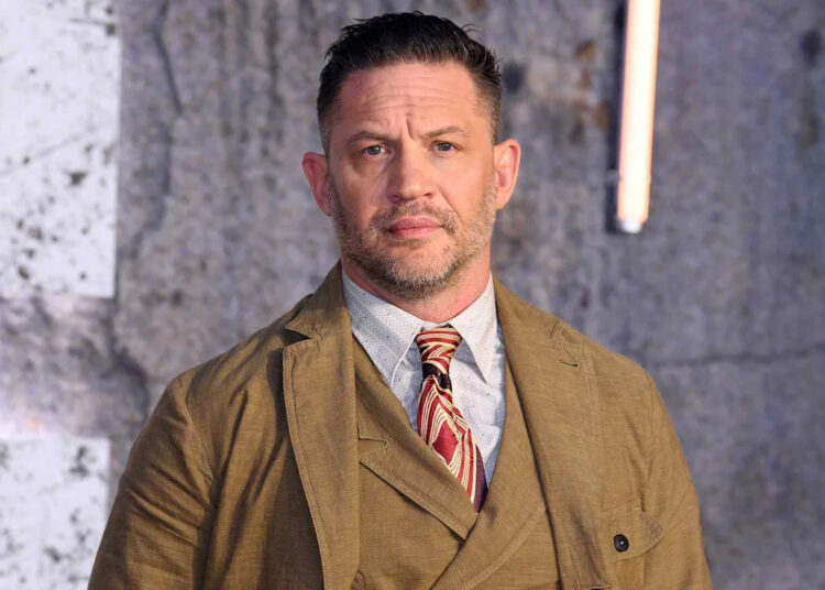 Tom Hardy is dropping a rap album amid his uncertain future on “MobLand”