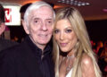 Aaron Spelling and Tori Spelling attend the 11th Annual Race to Erase MS in 2004Credit: Ray Mickshaw/WireImage