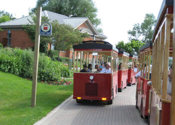 Hamilton Waterfront Trolley Tour full of people on a sunny summer day