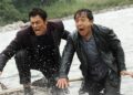 Johnny Knoxville and Jackie Chan in a still from Skiptrace (2016).