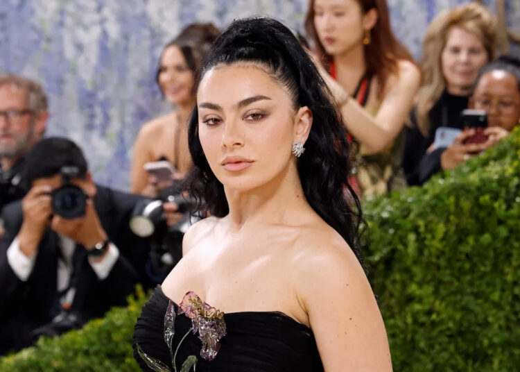 Who are the 3 men on Charli XCX’s new album cover? Hint: they’re legends.
