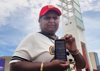 Bina Ramroop holds proof of the ticket she bought through StubHub for the World Cup Group H soccer match between Spain and Cape Verde in Atlanta on Monday.