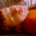 Jesse Eisenberg as Kenny lying on the ground outside in Get Real