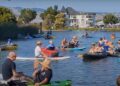 Folks in boats listen to music during the annual Bands on the Basin event in Petaluma. (Anderson Templeton / Petaluma Argus-Courier)