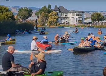 Folks in boats listen to music during the annual Bands on the Basin event in Petaluma. (Anderson Templeton / Petaluma Argus-Courier)