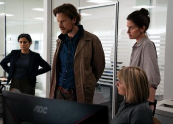 One man and four women look at a computer screen in "The Chestnut Man."