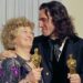 "My Left Foot" stars Brenda Fricker, winner of Oscar for best supporting actress, and Daniel Day Lewis, winner of Oscar for best actor, at the 62nd Annual Academy Awards in Los Angeles, March 26, 1990. (AP Photo/Bob Galbraith, File)