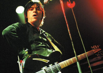 Johnny Marr performs onstage in the Netherlands on March 31, 2003.