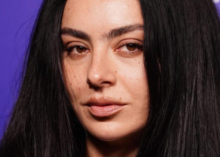 Charli XCX steps onto film set with Vincent Cassel in new music video