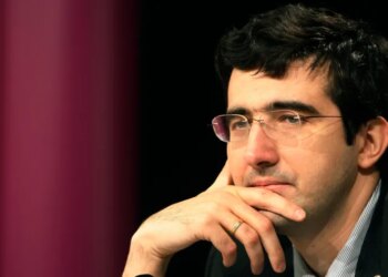 Russia's Vladimir Kramnik meets the media during a news conference after the 10th game of the Chess World Championship in the Art and Exhibition Hall of the Federal Republic of Germany in Bonn, western Germany, Oct. 27, 2008. (AP Photo/Hermann J. Knippertz, File)