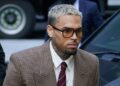 Grammy-winning singer Chris Brown makes his way into Southwark Crown Court, in London, Friday, July 11, 2025. (AP Photo/Alberto Pezzali, File)