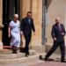Sir Clive Alderton, right, leaves Buckingham Palace with newly appointed Prime Minister Andy Burnham and his wife Marie-France van Heel on 20 July