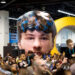 Inflatable blowup of jmancurly and his yellow tape on-site at VidCon 2026 (Credit: VidCon)