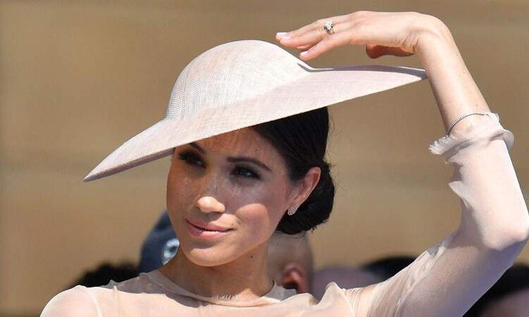 MMarkle recruited a spiritual cleanser for her home, according to sources.MEGA