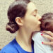 Emmy Rossum kissing her babyCredit: Emmy Rossum/Instagram