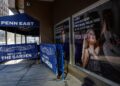 A poster featuring an image and quote from Taylor Swift is displayed outside Madison Square Garden in New York. (kena betancur / AFP via Getty Images)