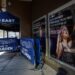 A poster featuring an image and quote from Taylor Swift is displayed outside Madison Square Garden in New York. (kena betancur / AFP via Getty Images)