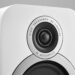 A close-up of the tweeter on a pair of Q Acoustic speakers