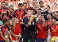 King Felipe VI of Spain lifts the FIFA World Cup Winner’s Trophy while Queen Letizia of Spain, Princess Leonor of Spain and Princess Sofia of Spain and players of Spain watch at the award ceremony following the FIFA World Cup 2026 Final match between Spain and Argentina at New York New Jersey Stadium on July 19, 2026 in East Rutherford, New Jersey.